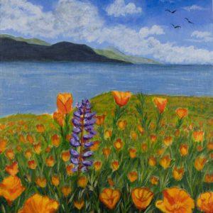 Bright orange poppies bloom against a scenic backdrop of the bay and majestic mountains, blending vivid colors with breathtaking natural landscapes